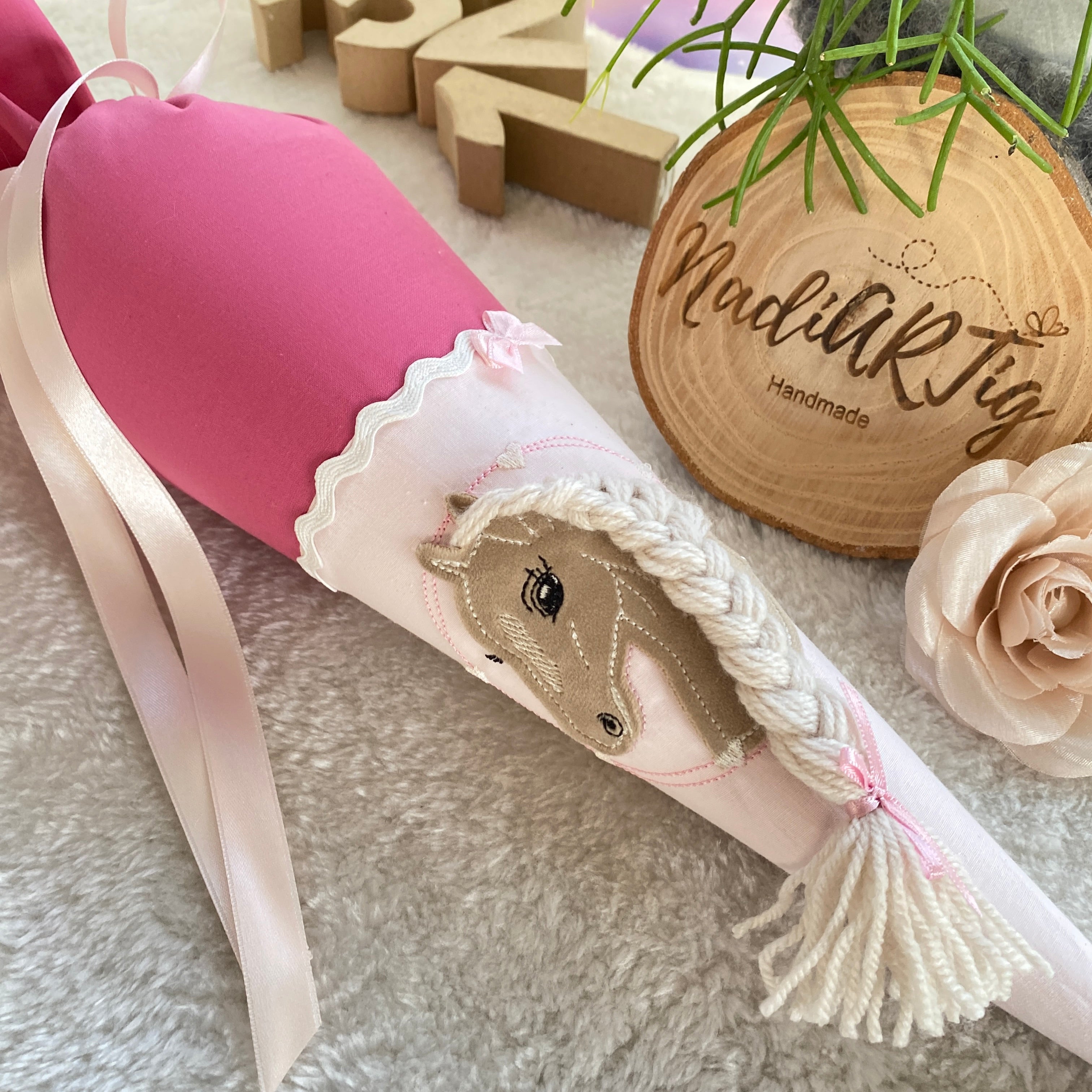 Geschwistertute Pferd in beere rose