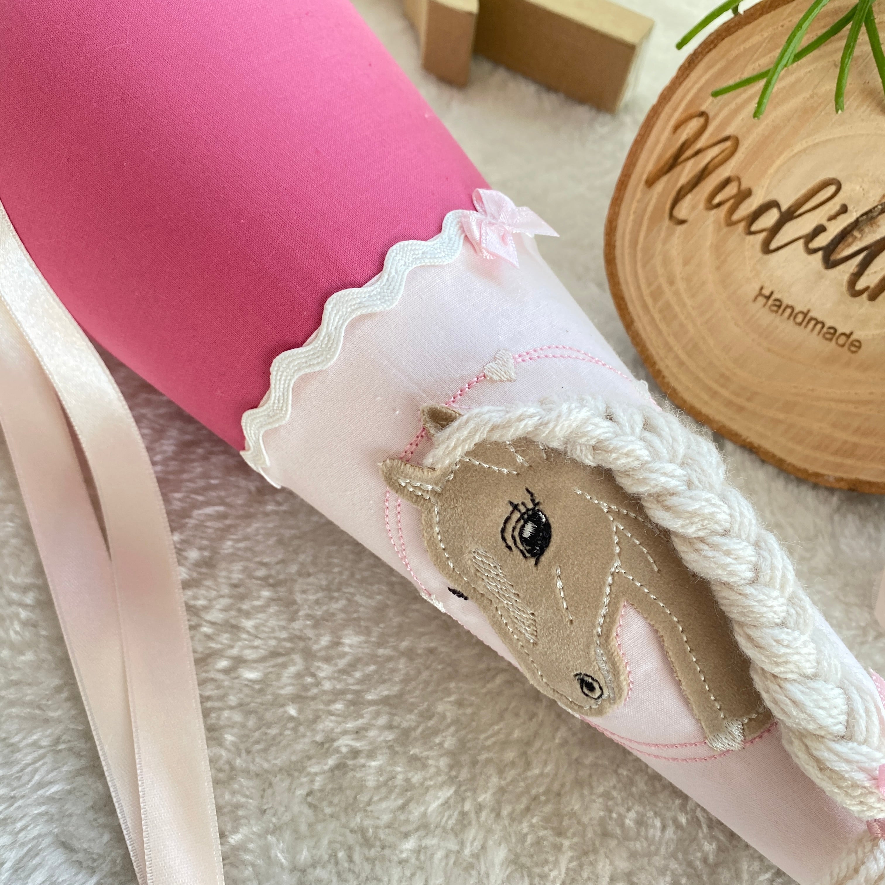 Geschwistertute Pferd in beere rose