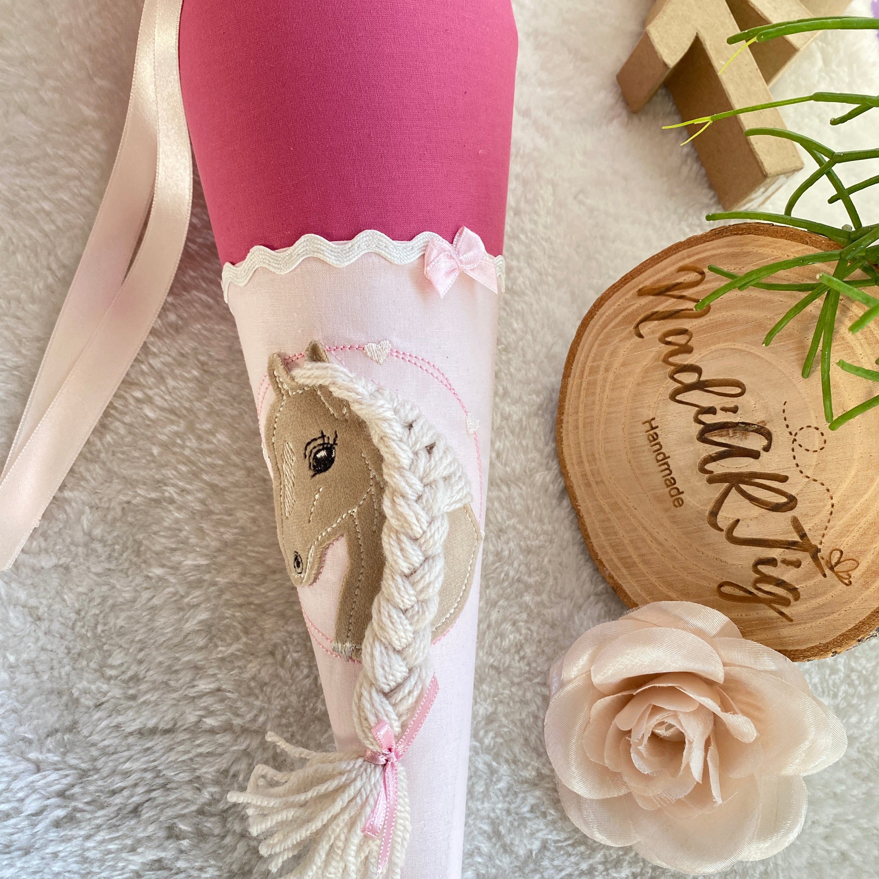 Geschwistertute Pferd in beere rose