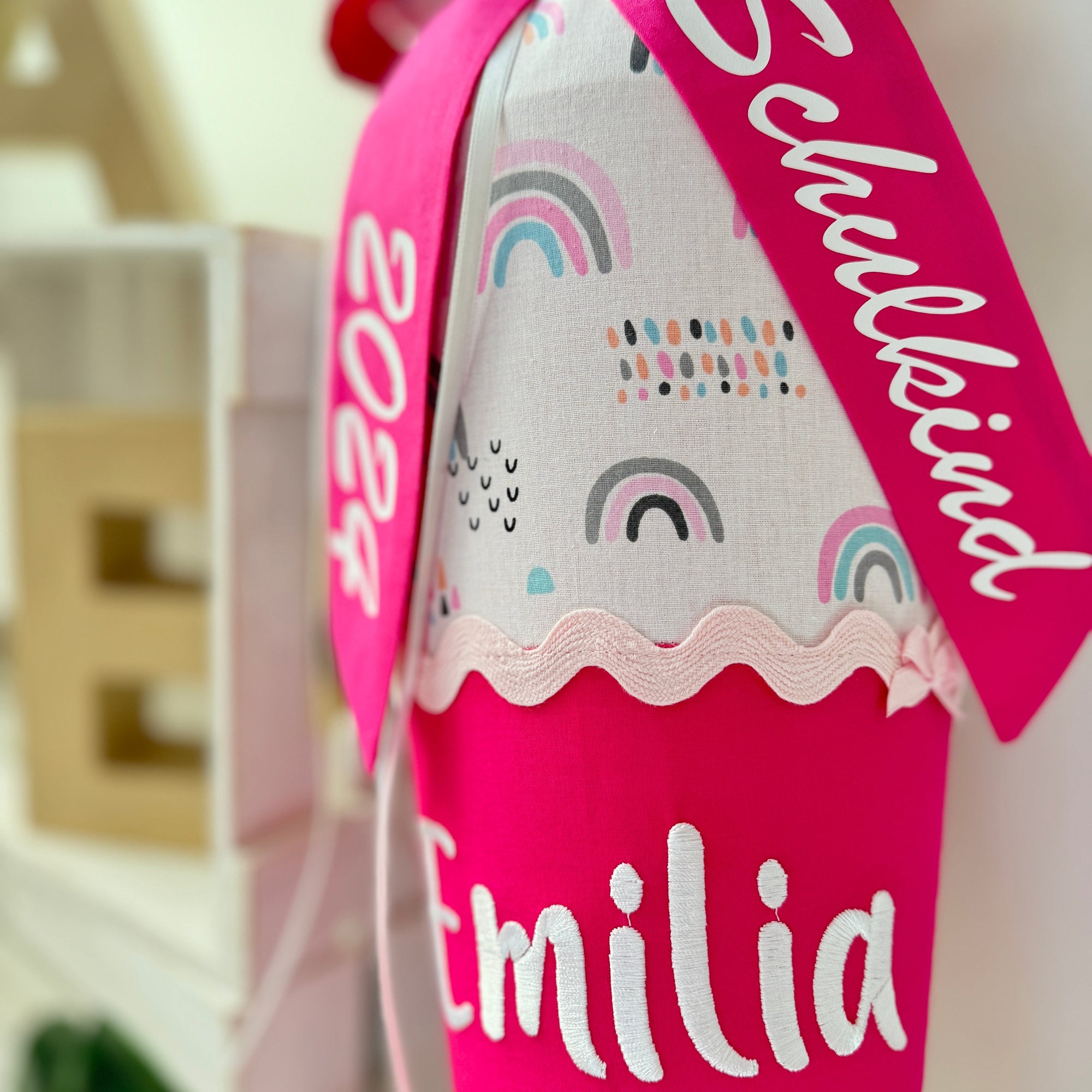 Schultüte Einhorn mit Wollmähne Regenbogen pink