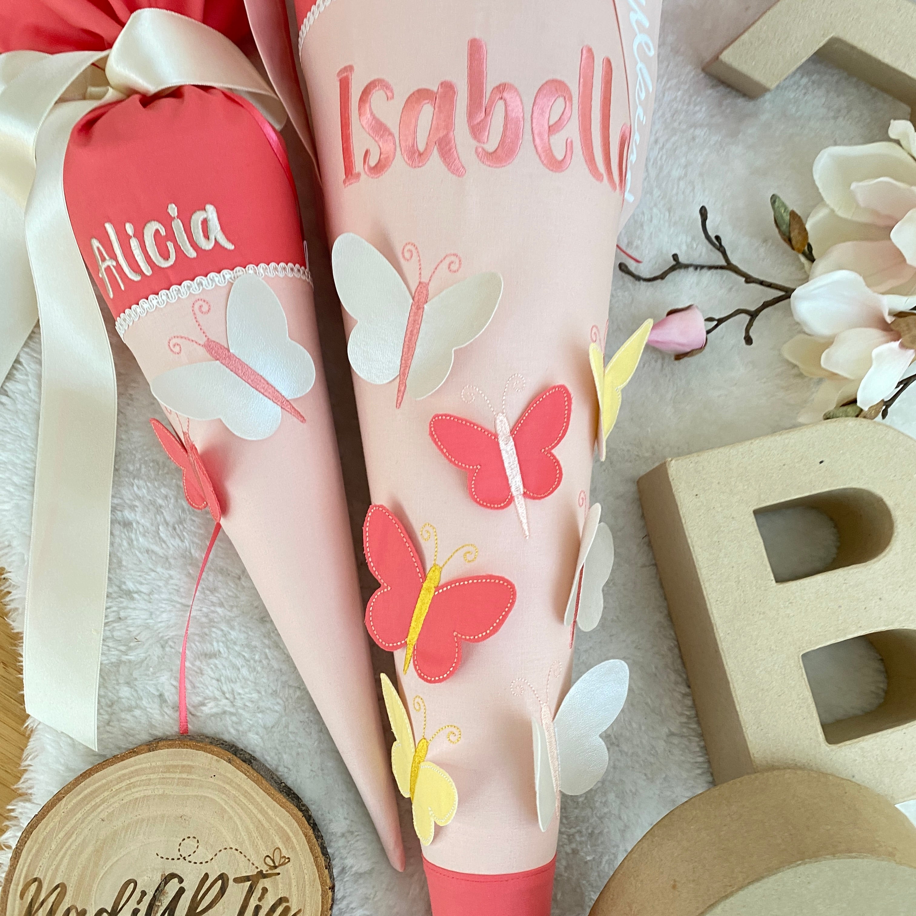 Geschwister-Schultüte mit Schmetterlinge in Koralle